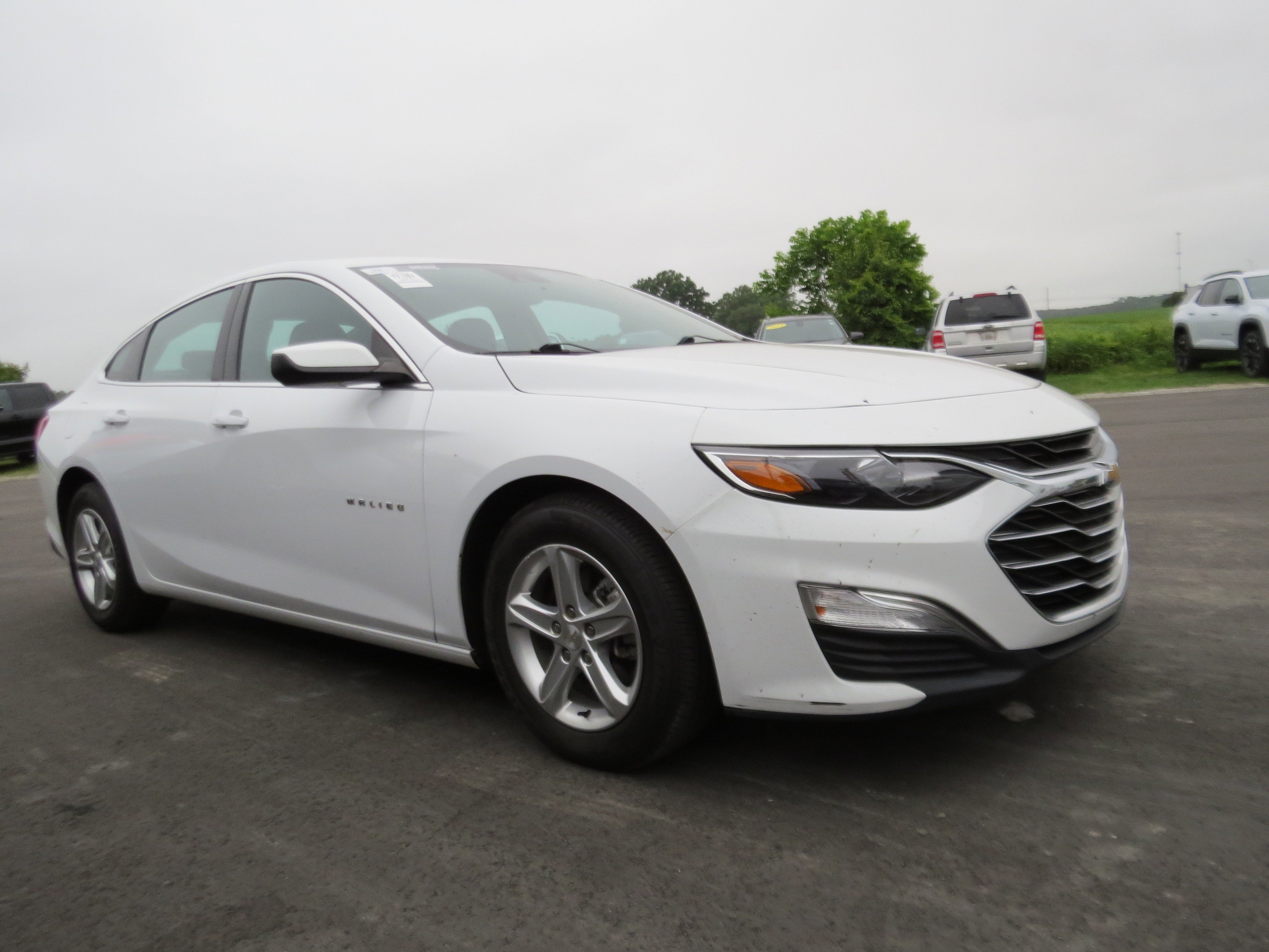 2021 Chevrolet Malibu LS in Summit White — front three-quarter view