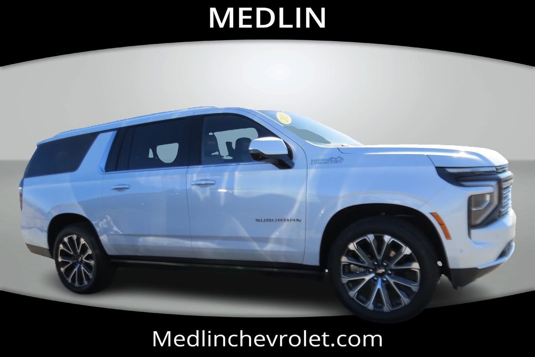 2025 Chevrolet Suburban High Country in Iridescent Pearl Tricoat — front three-quarter view