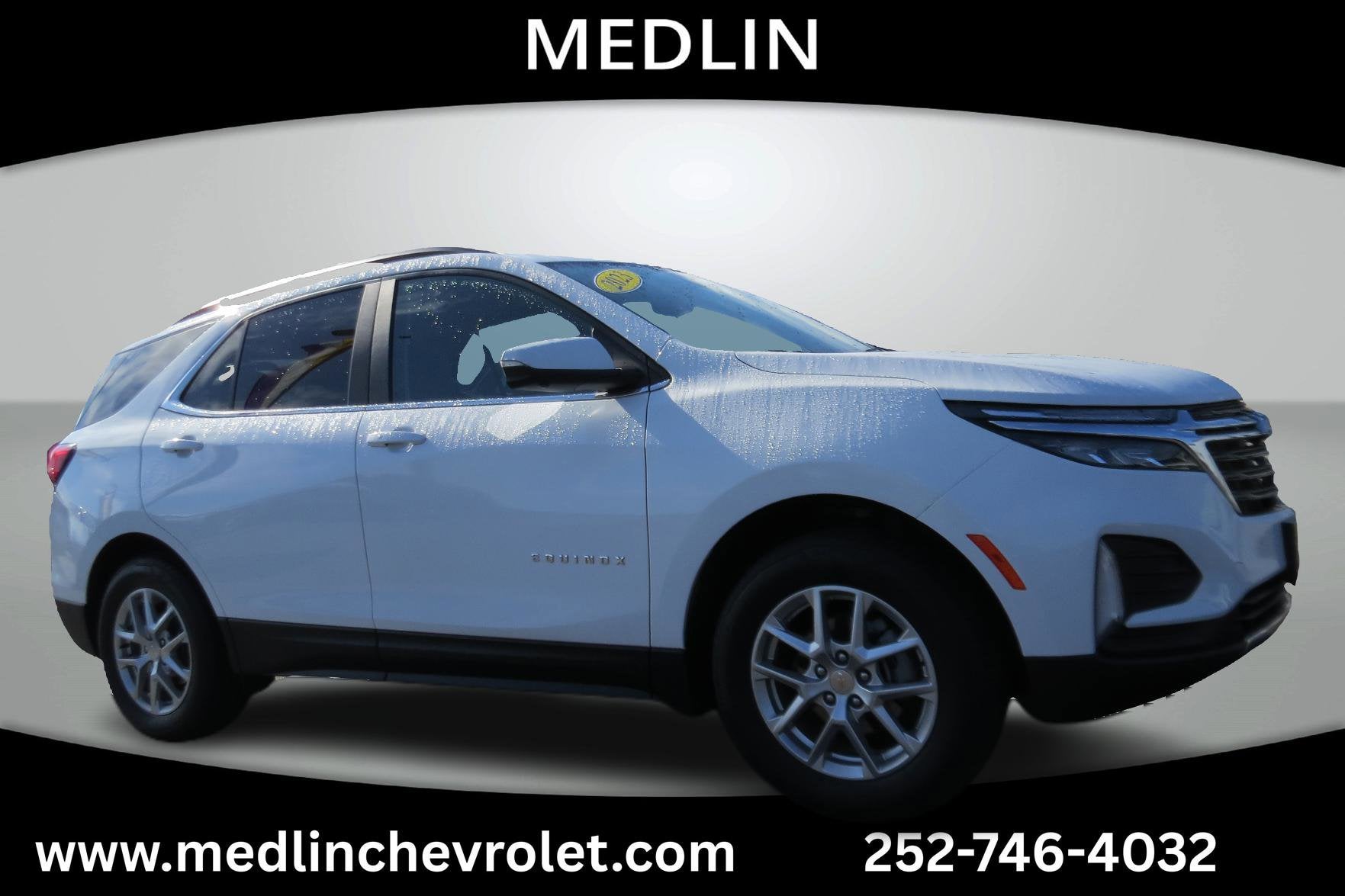 2023 Chevrolet Equinox LT in Summit White — front three-quarter view