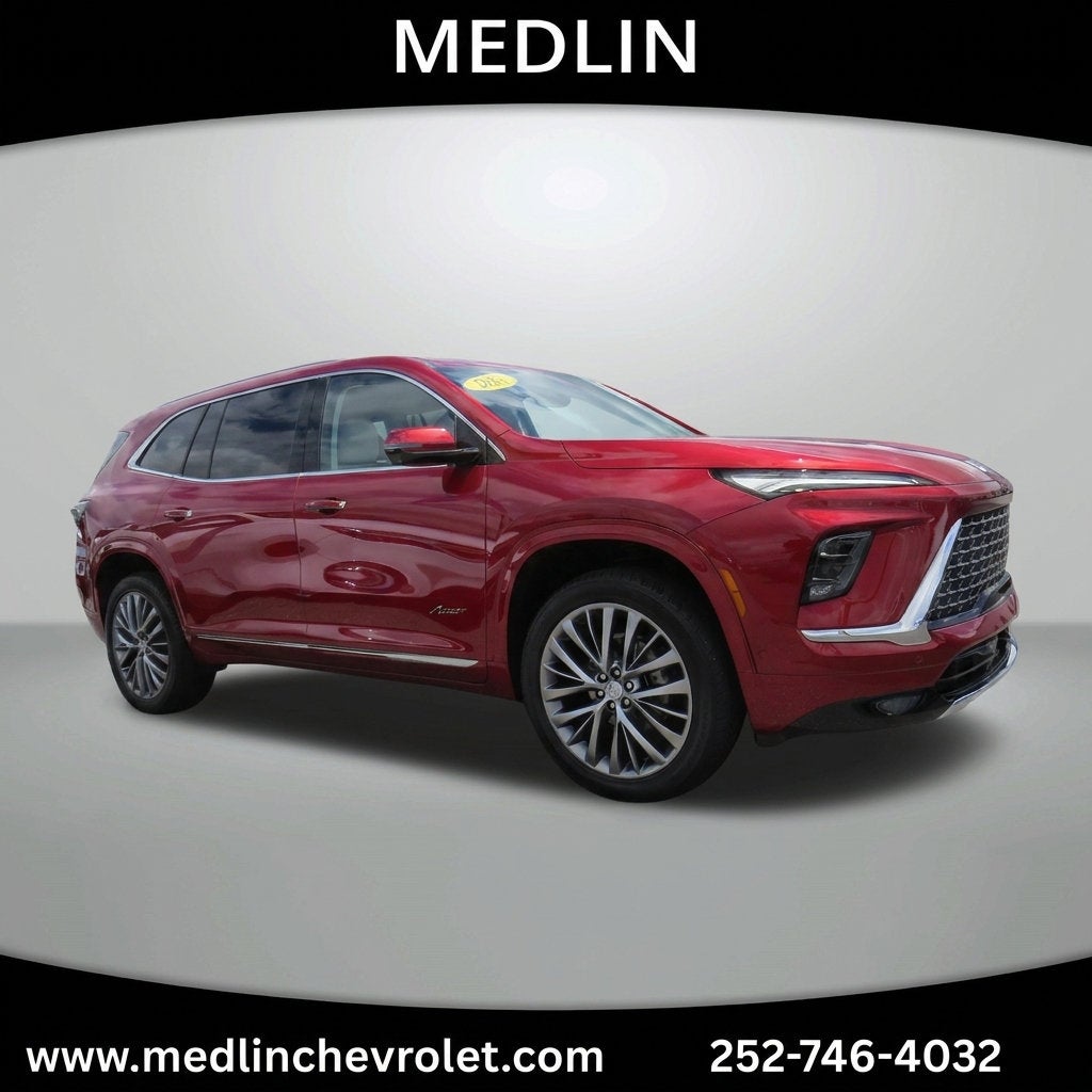 2025 Buick Enclave Avenir in Cherry Red Tintcoat — front three-quarter view