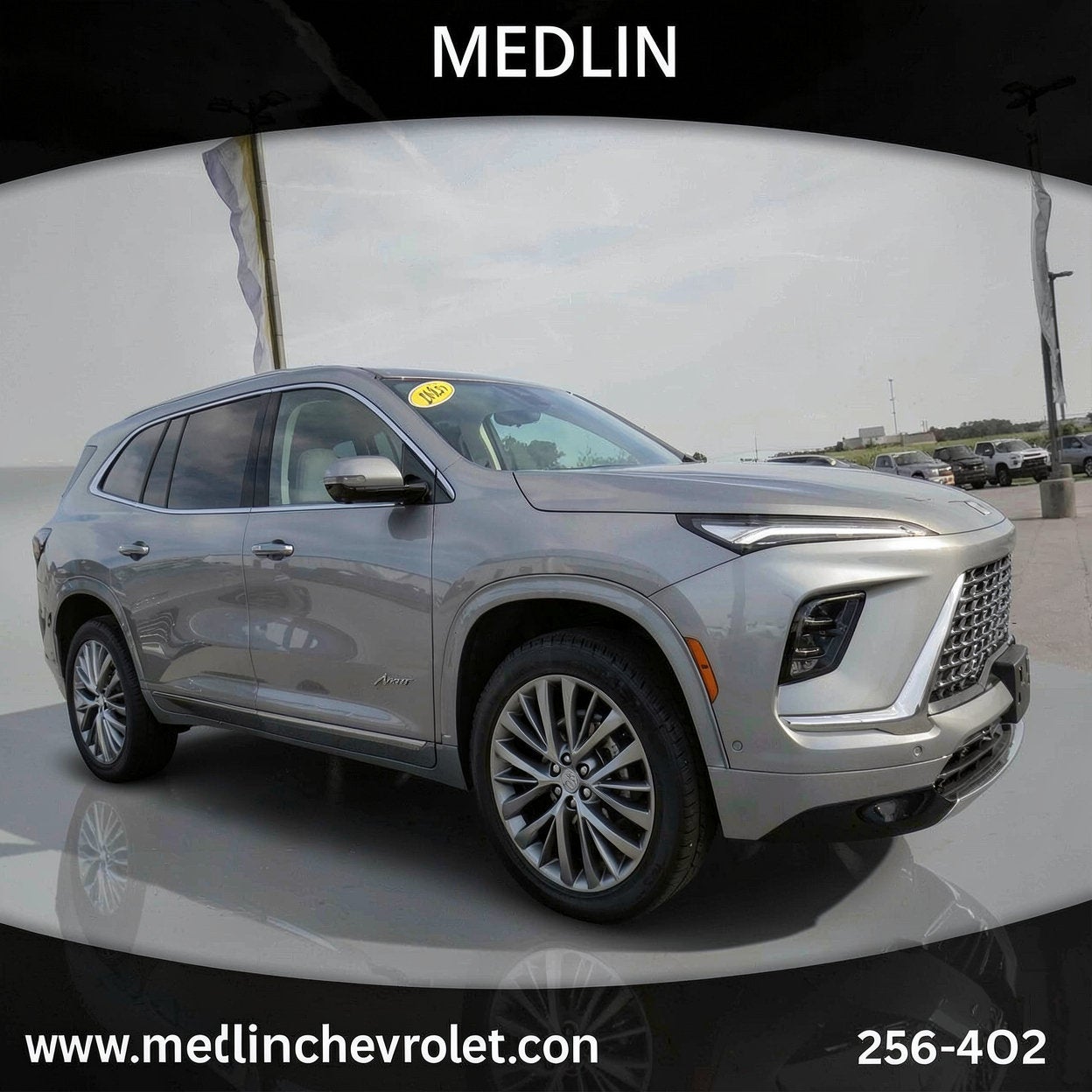 2025 Buick Enclave Avenir in Moonstone Gray Metallic — front three-quarter view