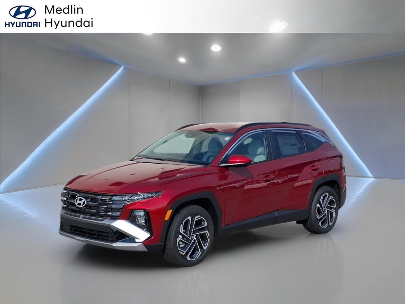 2026 Hyundai TUCSON SEL Plus in Ultimate Red — front three-quarter view
