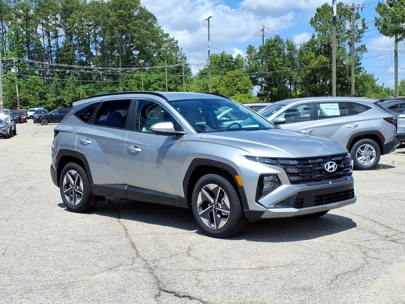 2026 Hyundai TUCSON SEL in Shimmering Silver — front three-quarter view