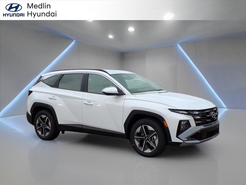 2026 Hyundai TUCSON SEL in Serenity White Pearl — front three-quarter view