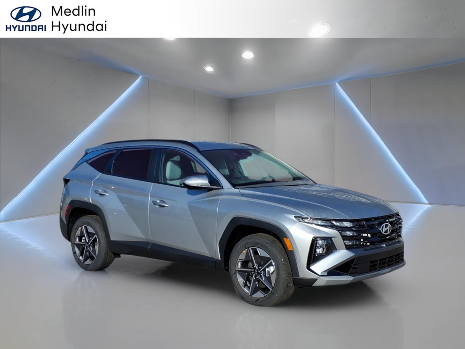 2026 Hyundai TUCSON SEL in Shimmering Silver — front three-quarter view