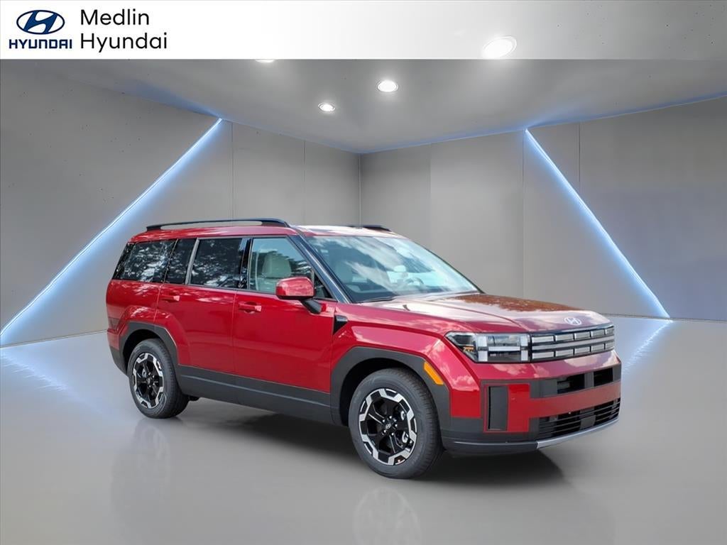 2026 Hyundai SANTA FE SEL in Ultimate Red — front three-quarter view