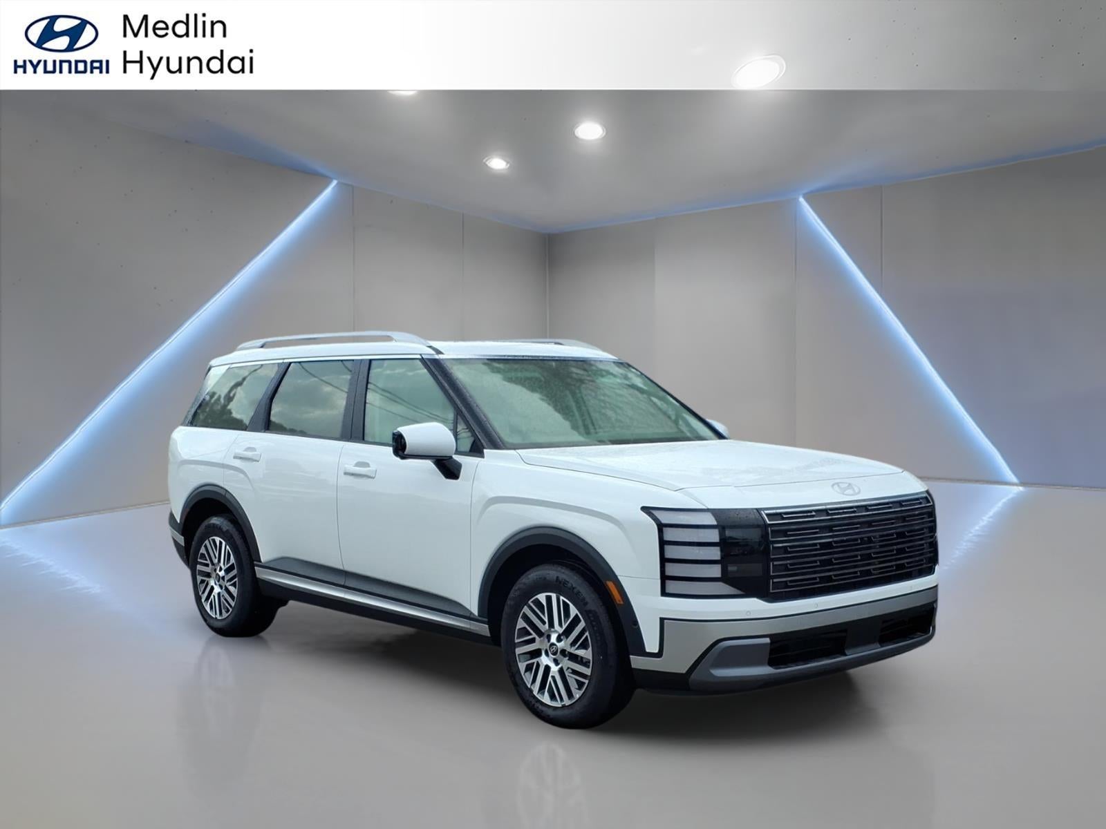 2026 Hyundai PALISADE SEL Premium 7P in Creamy White Pearl — front three-quarter view