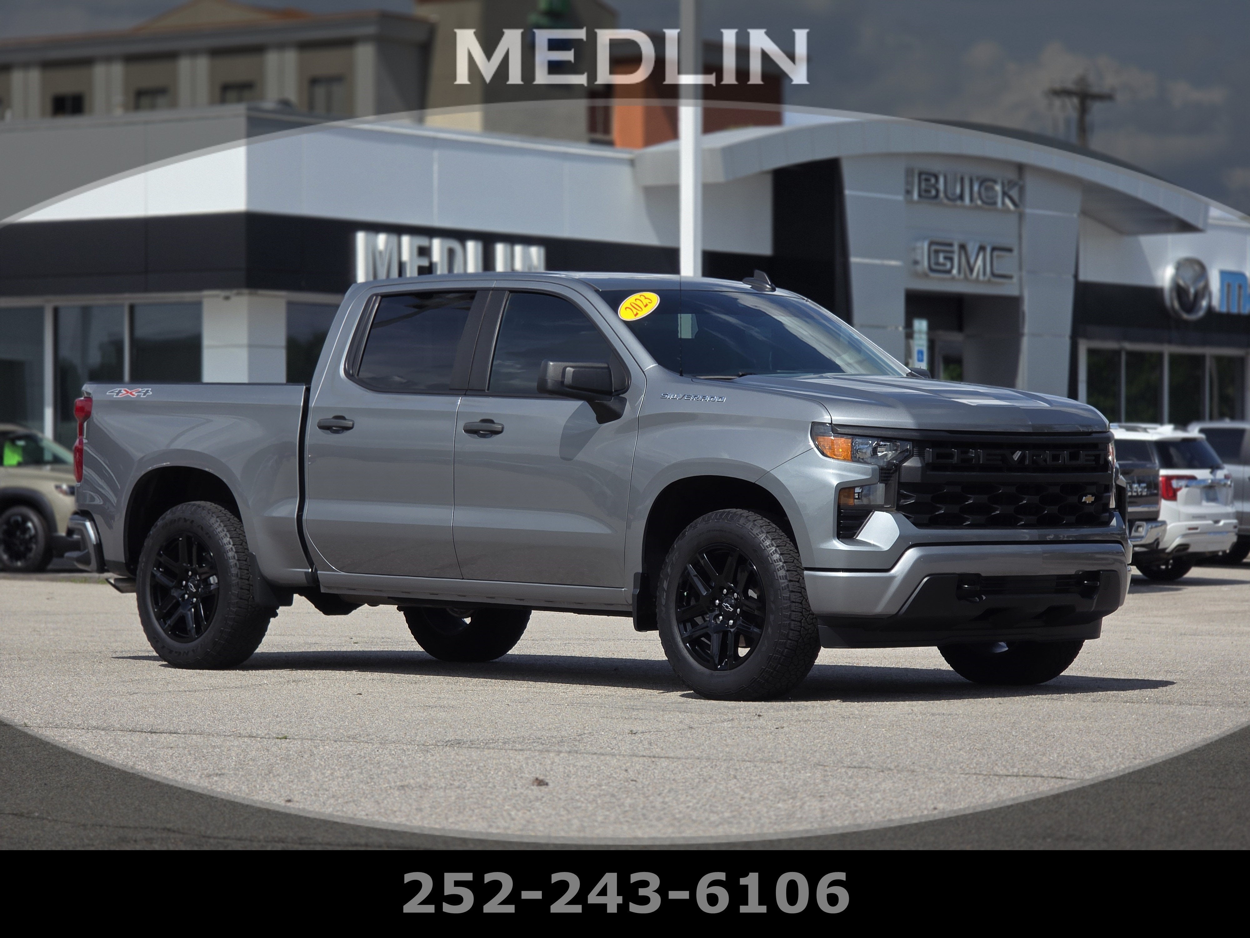 2023 Chevrolet Silverado 1500 Custom in Sterling Gray Metallic — front three-quarter view