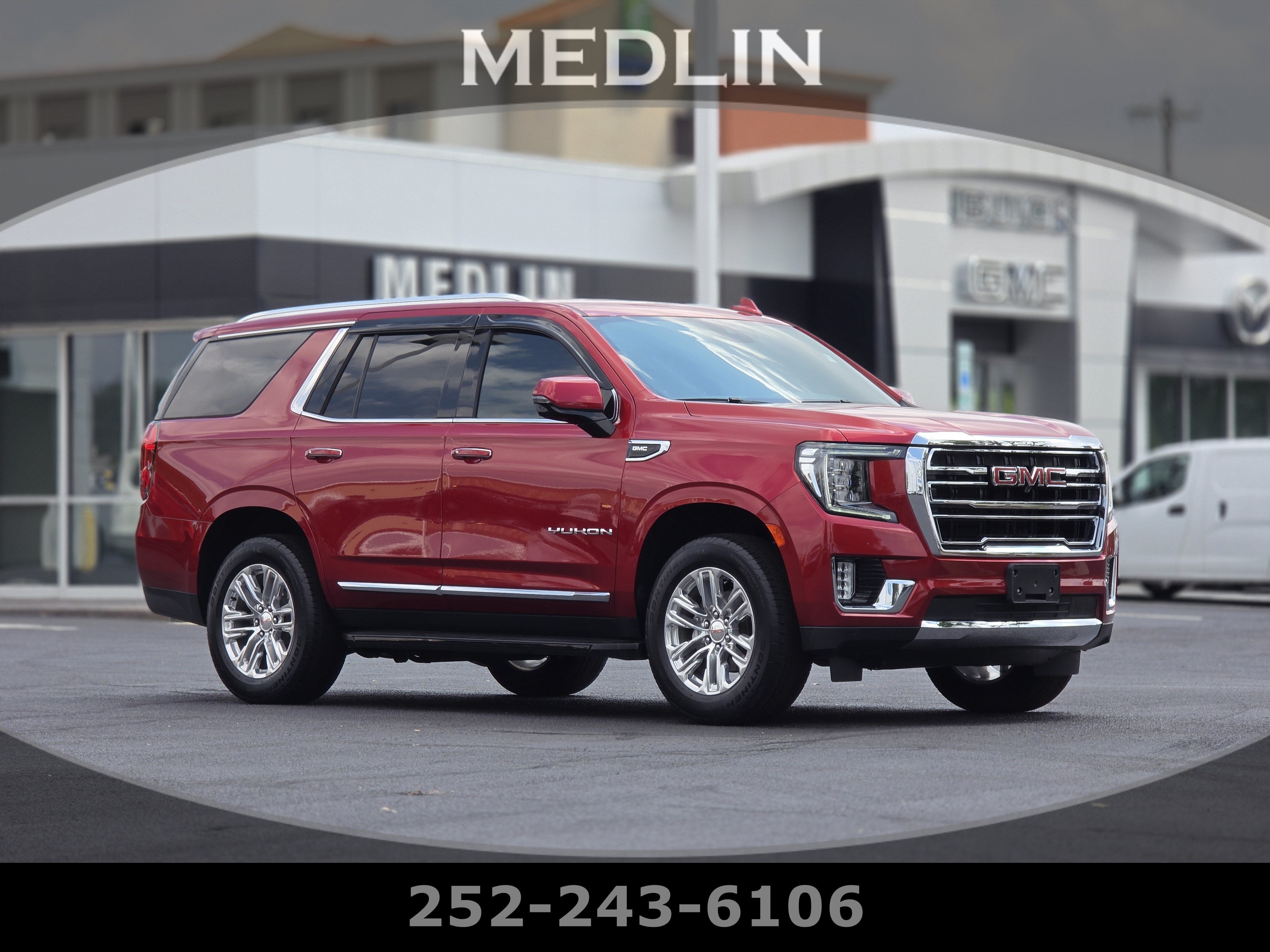 2024 GMC Yukon SLT in Volcanic Red Tintcoat — front three-quarter view