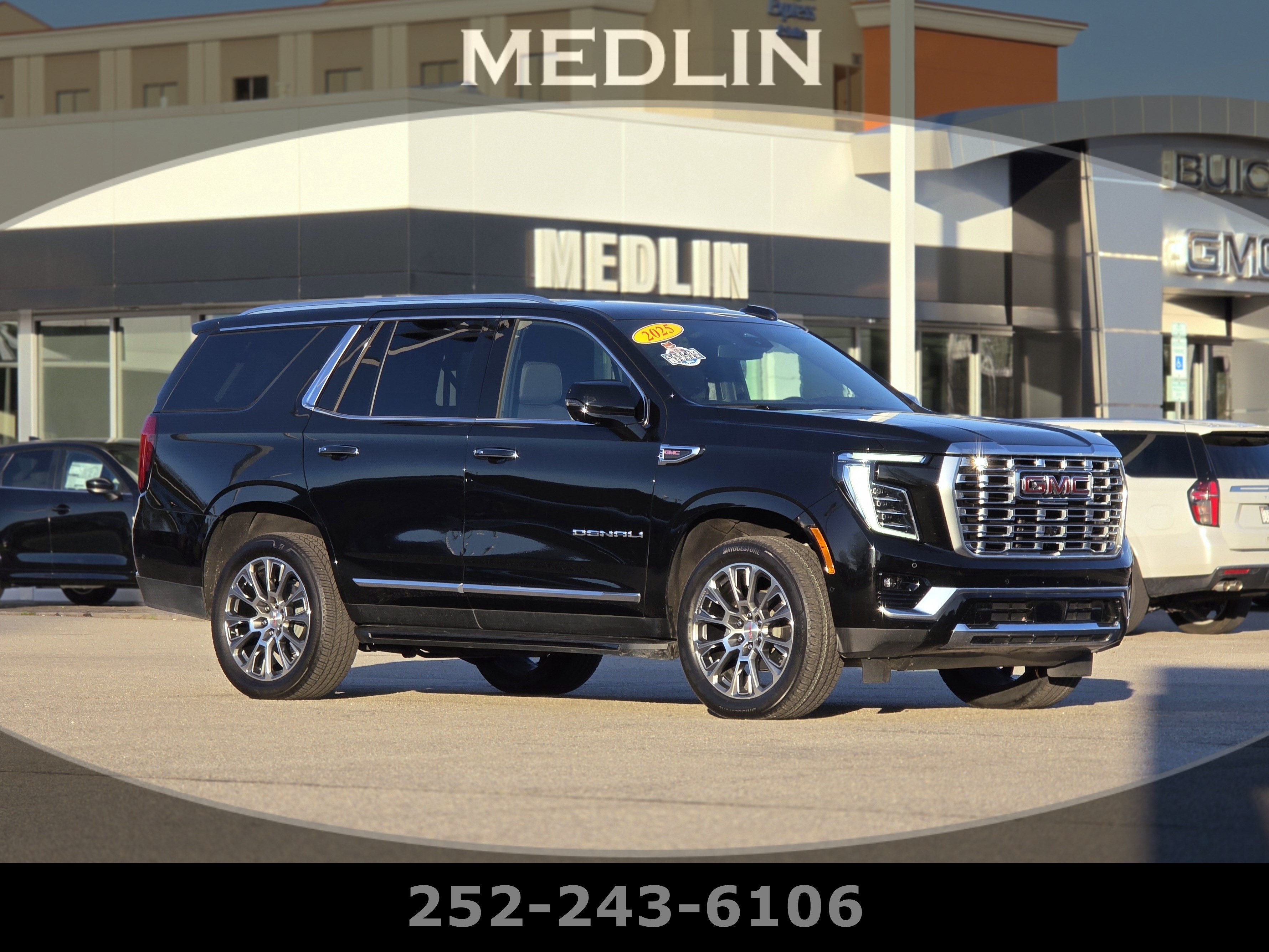 2025 GMC Yukon Denali in Onyx Black — front three-quarter view