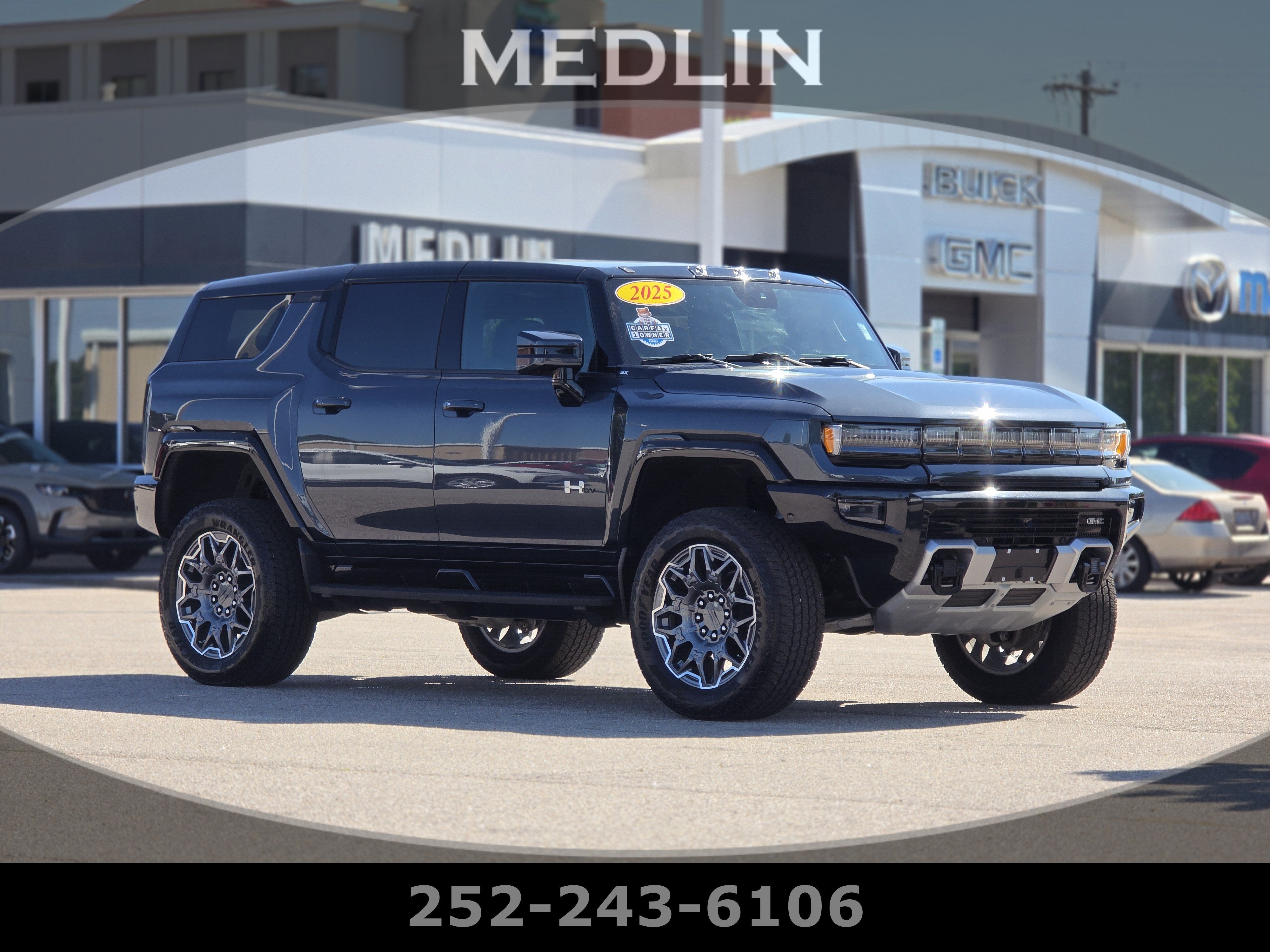 2025 GMC HUMMER EV SUV 3X in Graphite Blue Metallic — front three-quarter view