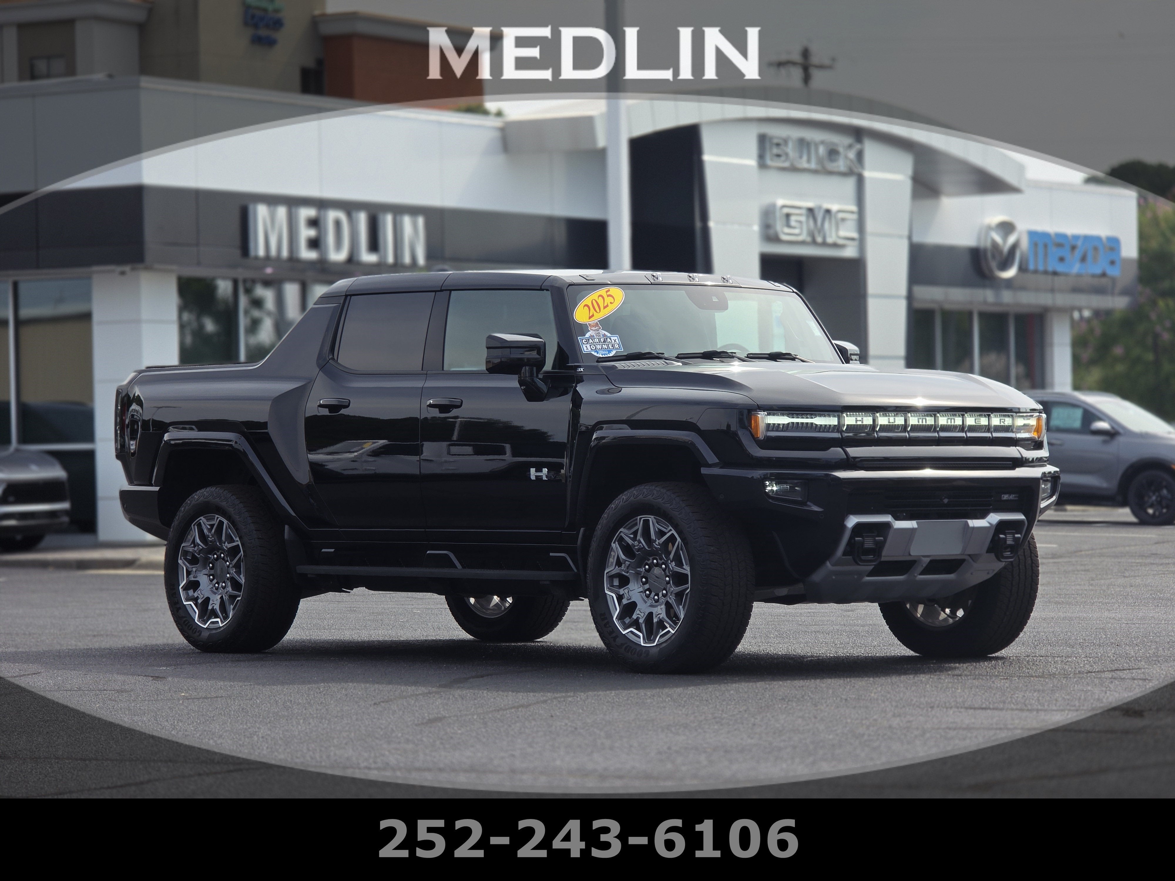 2025 GMC HUMMER EV Pickup 3X in Void Black — front three-quarter view