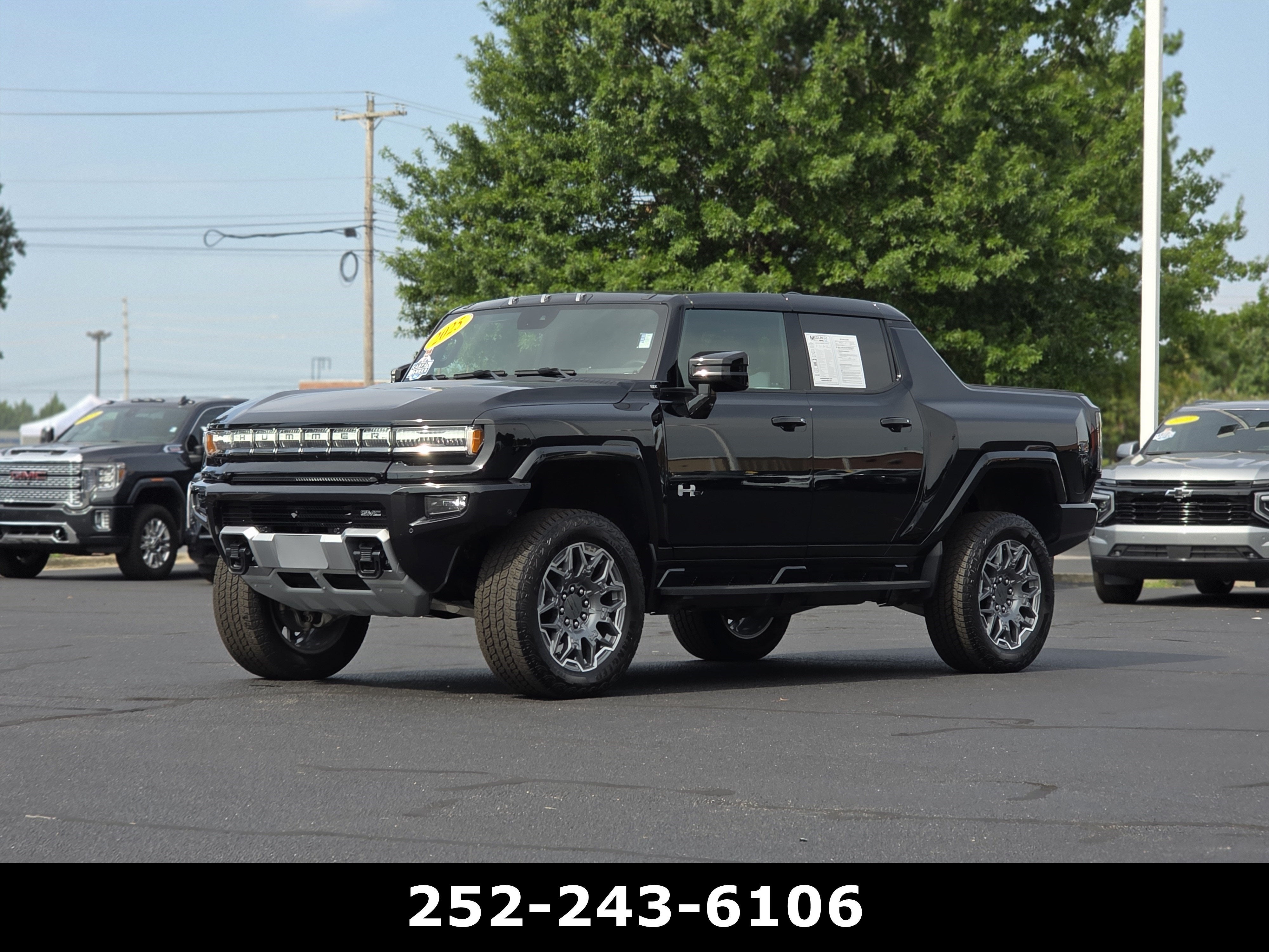 2025 GMC HUMMER EV Pickup — rear three-quarter view