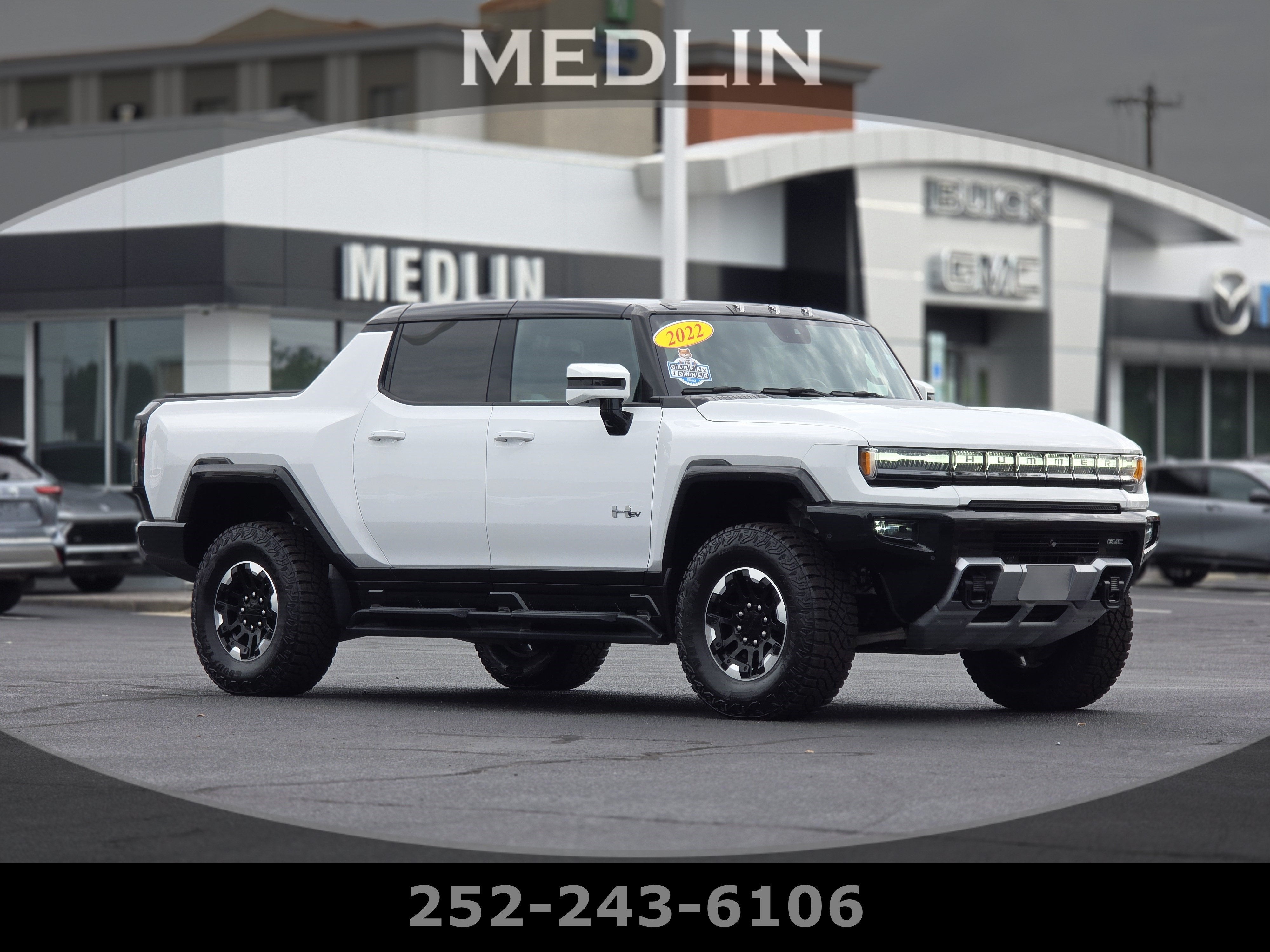 2022 GMC HUMMER EV Pickup Hummer EV Pickup in Interstellar White — front three-quarter view