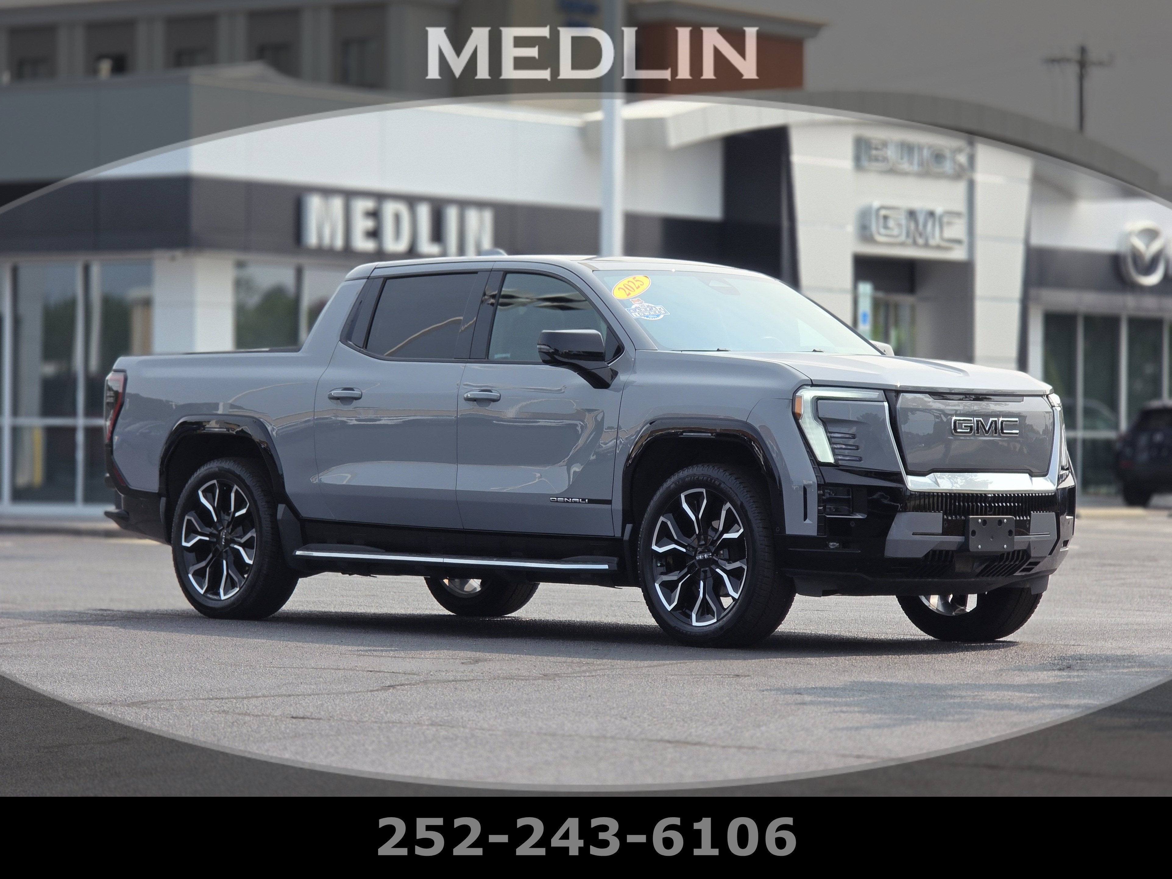 2025 GMC Sierra EV Max Range Denali in Thunderstorm Gray — front three-quarter view