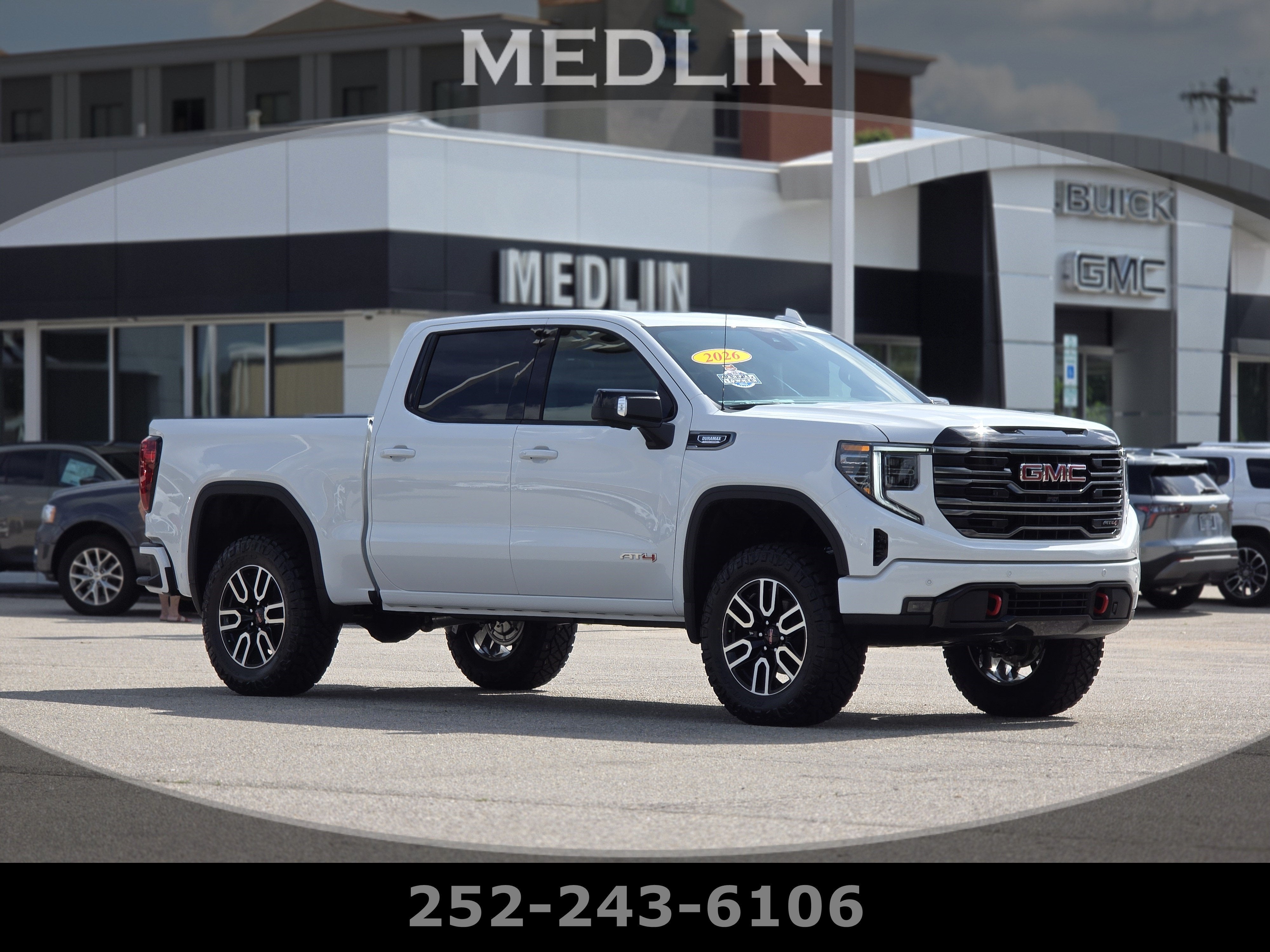 2026 GMC Sierra 1500 AT4 in Summit White — front three-quarter view
