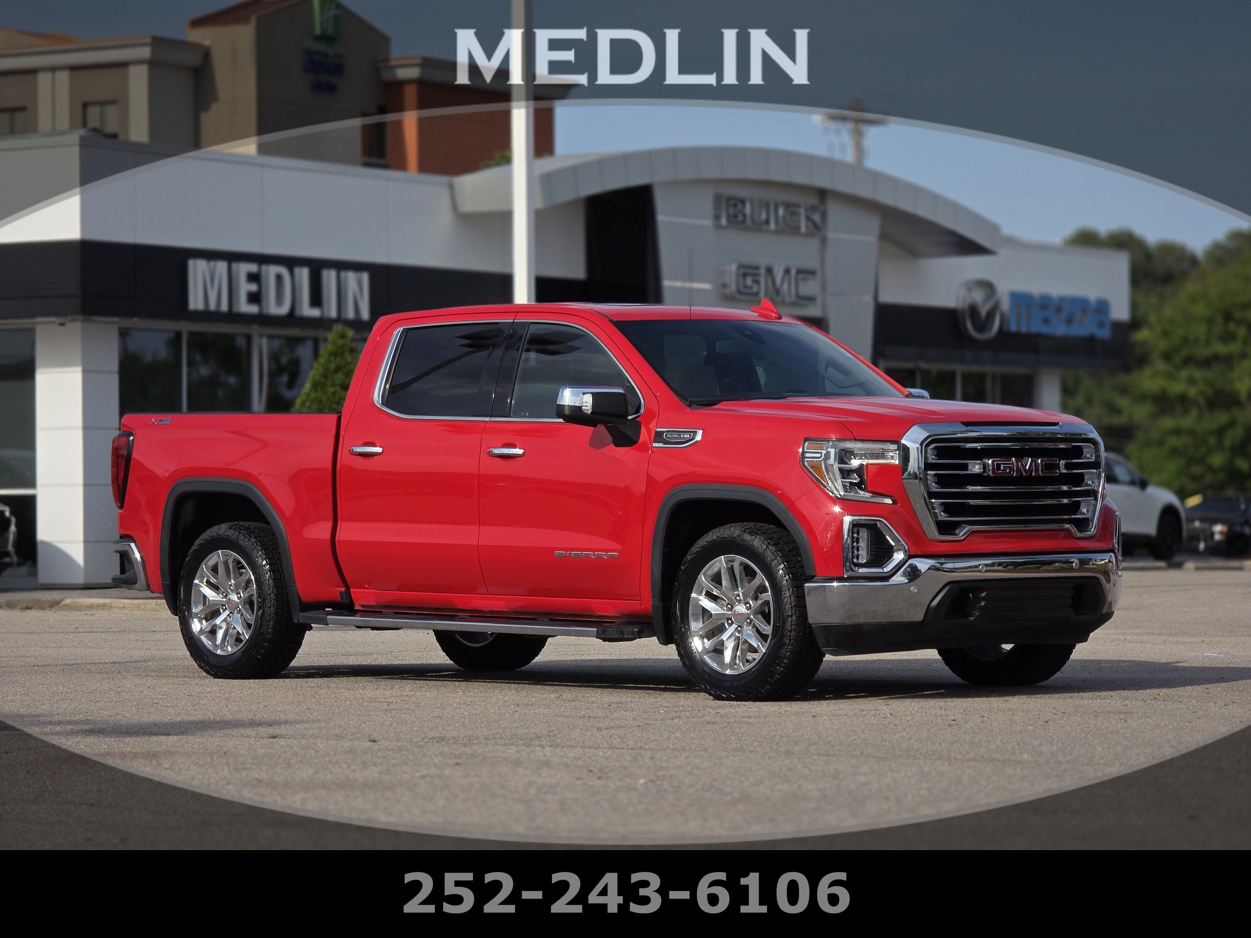 2021 GMC Sierra 1500 SLT in Cardinal Red — front three-quarter view