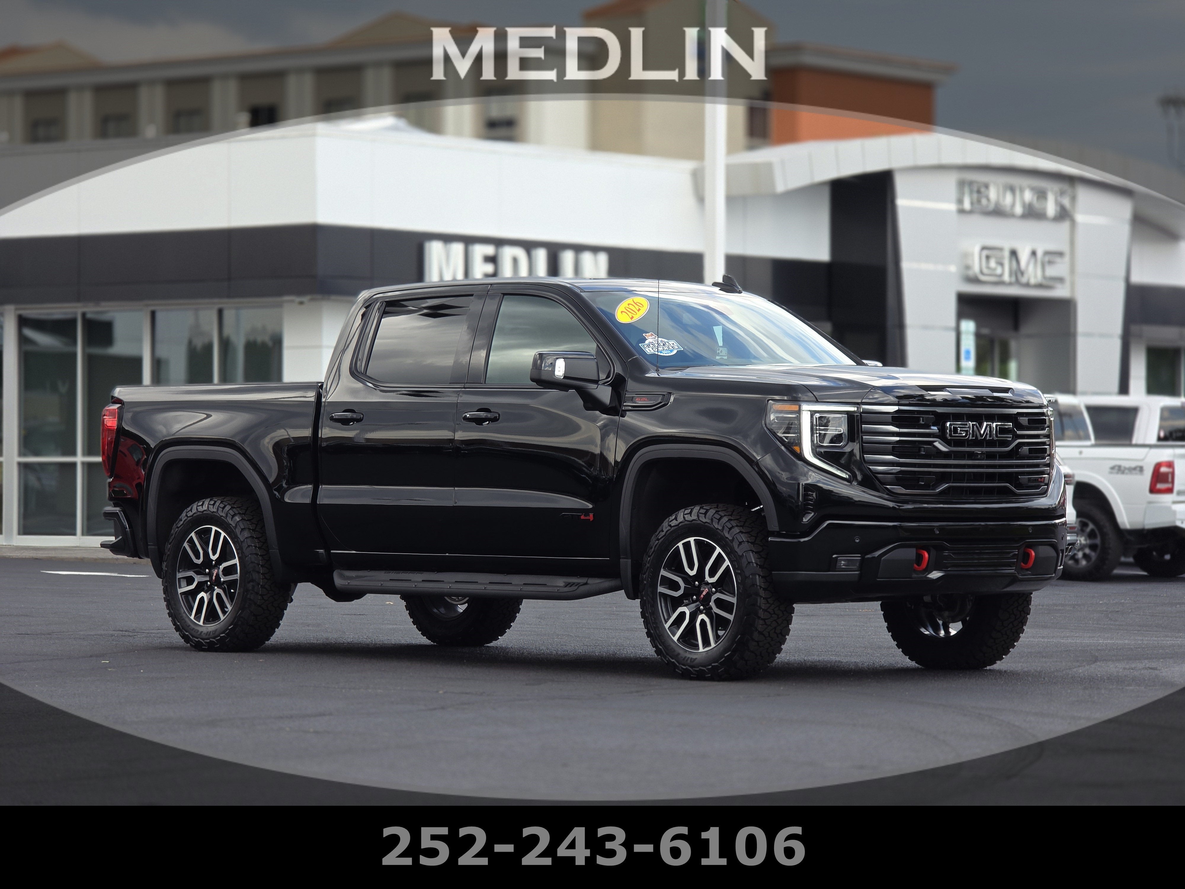 2026 GMC Sierra 1500 AT4 in Onyx Black — front three-quarter view