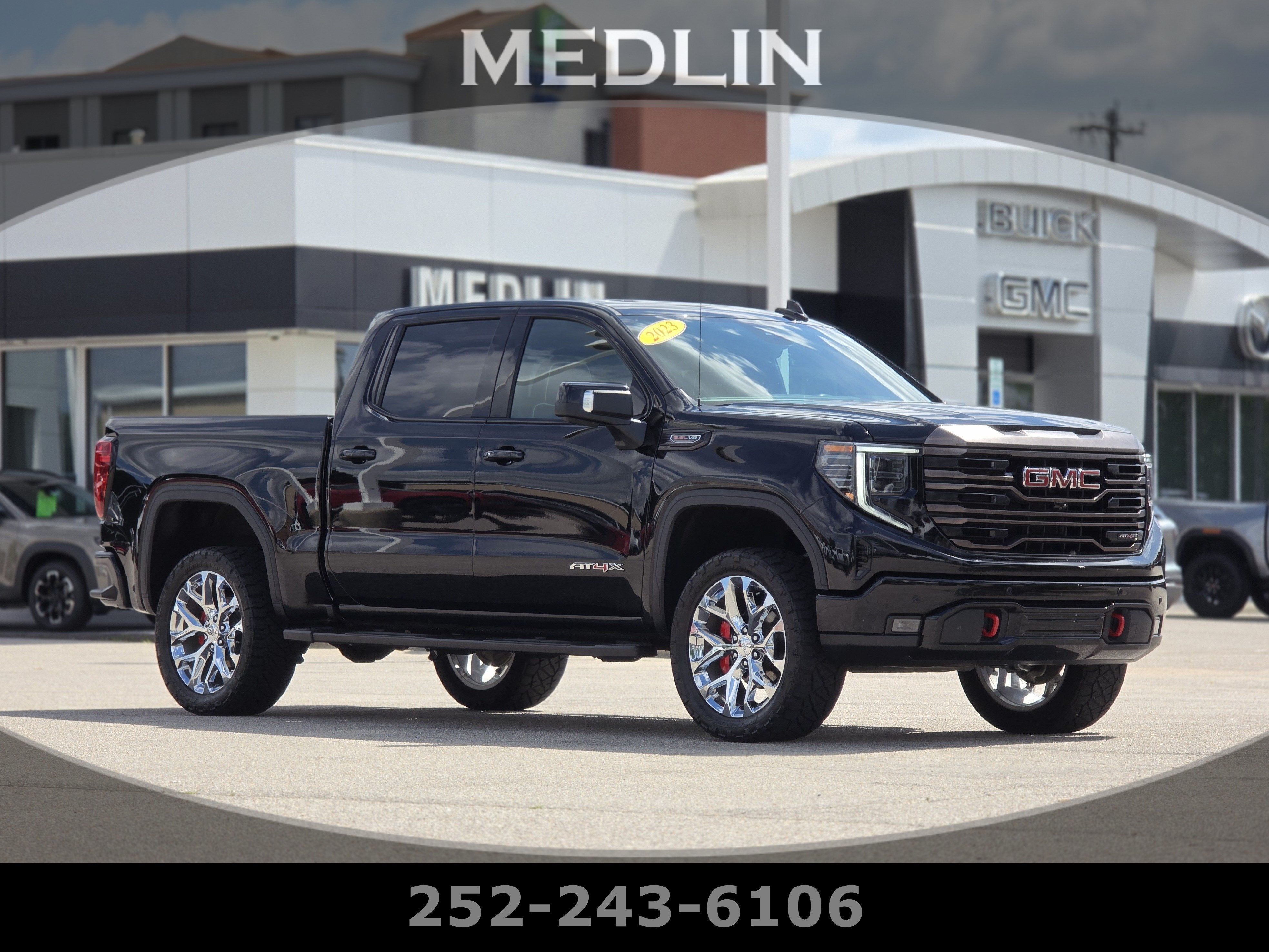 2023 GMC Sierra 1500 AT4X in Onyx Black — front three-quarter view
