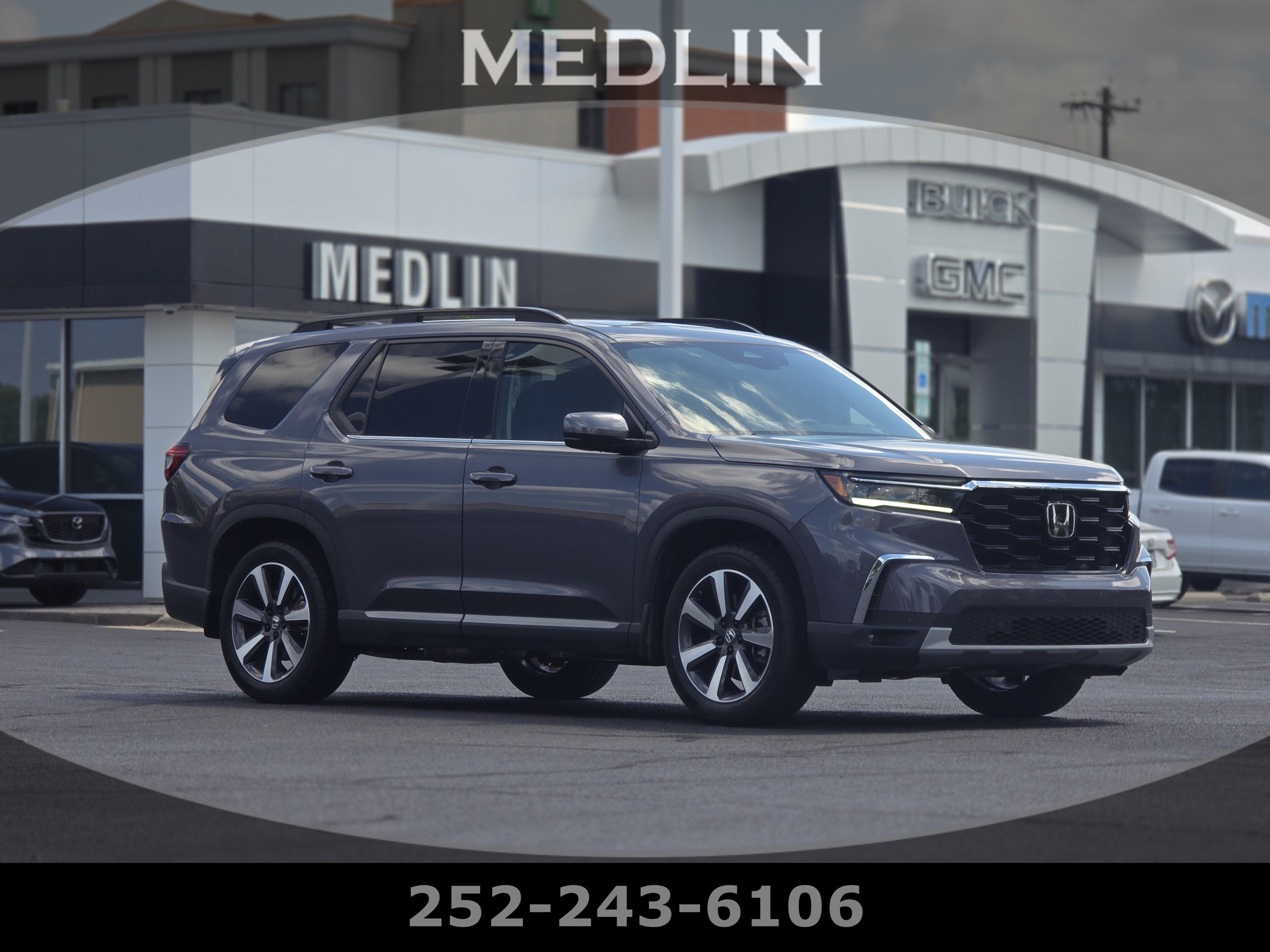 2025 Honda Pilot Touring in Other — front three-quarter view